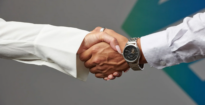 A handshake marking the start of a mortgage partnership